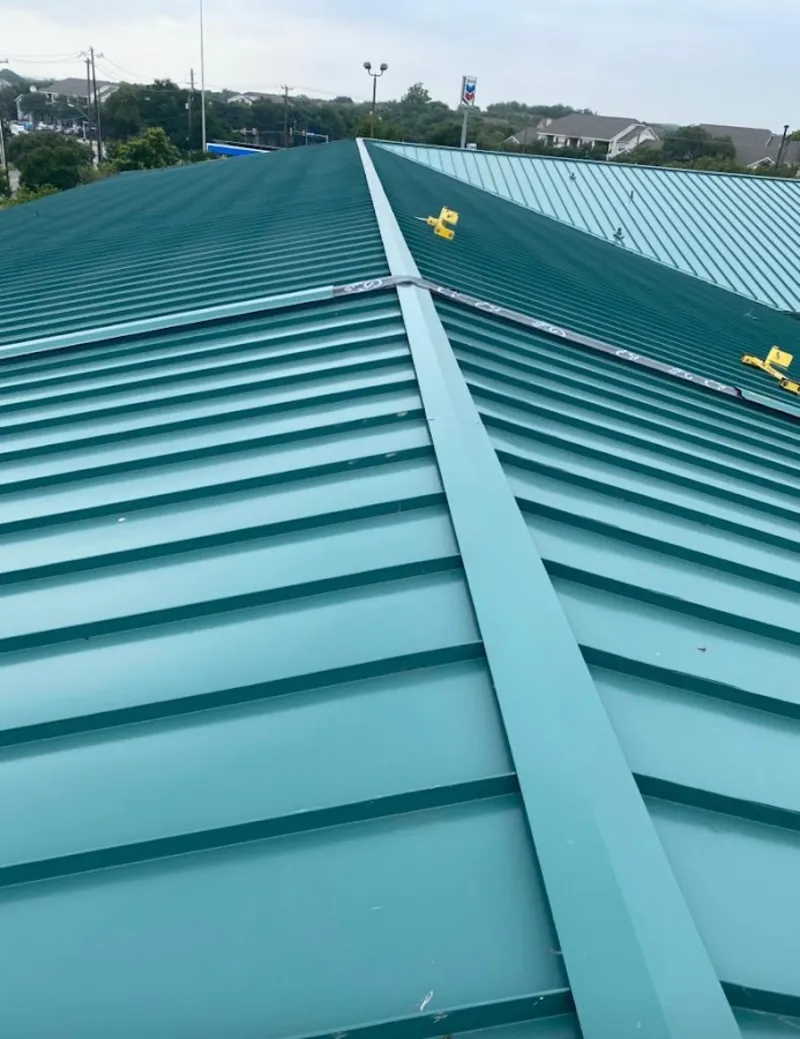 Green commercial metal roof ridge and valley for Metal Roof Repair in West Lafayette