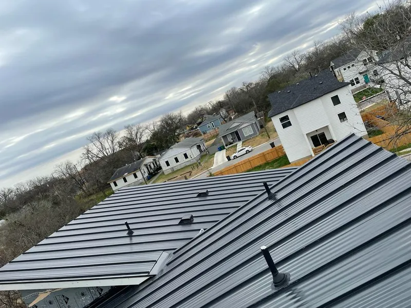 Standing seam metal roof panels with vents for Skylight Repair in West Lafayette